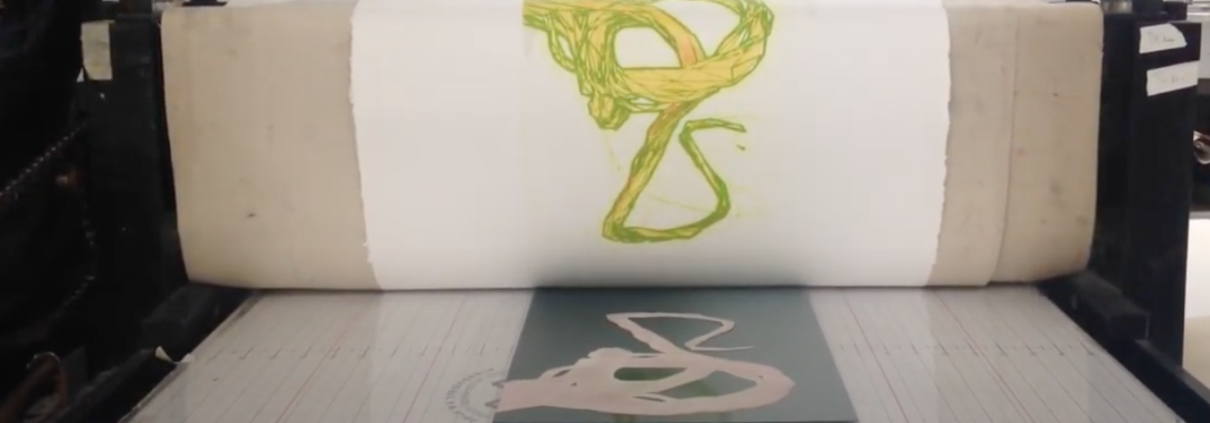 A print is pulled off the press