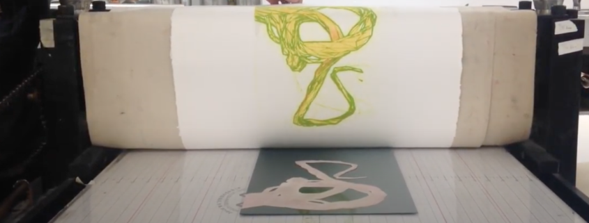 A print is pulled off the press